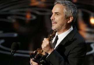 Alfonso Cuarón com seu Oscar por Gravidade