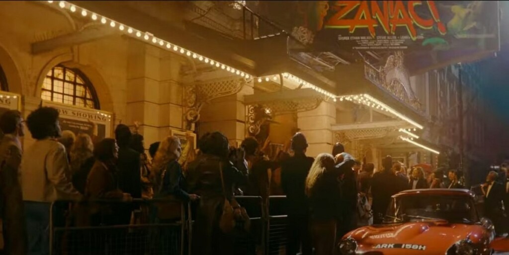 Cena de Loki com cartaz de Zaniac