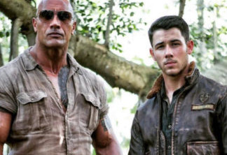 Nick Jonas e Dwayne "the Rock" Johnson em Jumanji: Bem-Vindo à Selva.