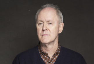 John Lithgow poses for a portrait at The Collective and Gibson Lounge Powered by CEG, during the Sundance Film Festival, on Sunday, Jan. 19, 2014 in Park City, Utah. (Photo by Victoria Will/Invision/AP)