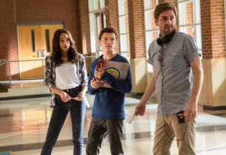 (l to r) Laura Harrier, Tom Holland and director Jon Watts on the set of Columbia Pictures' SPIDER-MAN™: HOMECOMING.