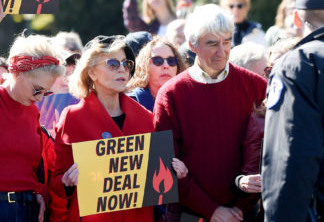 Actress and activist Jane Fonda (C) and actor Sam Waterston (C R) protest outside the US Capitol as part of a climate change protest, on October 18, 2019 in Washington, DC. (Photo by Olivier Douliery / AFP) (Photo by OLIVIER DOULIERY/AFP via Getty Images)