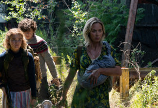 L-r, Regan (Millicent Simmonds), Marcus (Noah Jupe) and Evelyn (Emily Blunt) brave the unknown in "A Quiet Place Part II.”