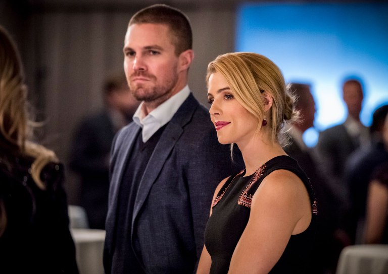 Arrow -- "Unmasked" -- Image Number: AR708a_0398b -- Pictured (L-R): Stephen Amell as Oliver Queen/Green Arrow and Emily Bett Rickards as Felicity Smoak -- Photo: Dean Buscher/The CW -- ÃÂ© 2018 The CW Network, LLC. All Rights Reserved.
