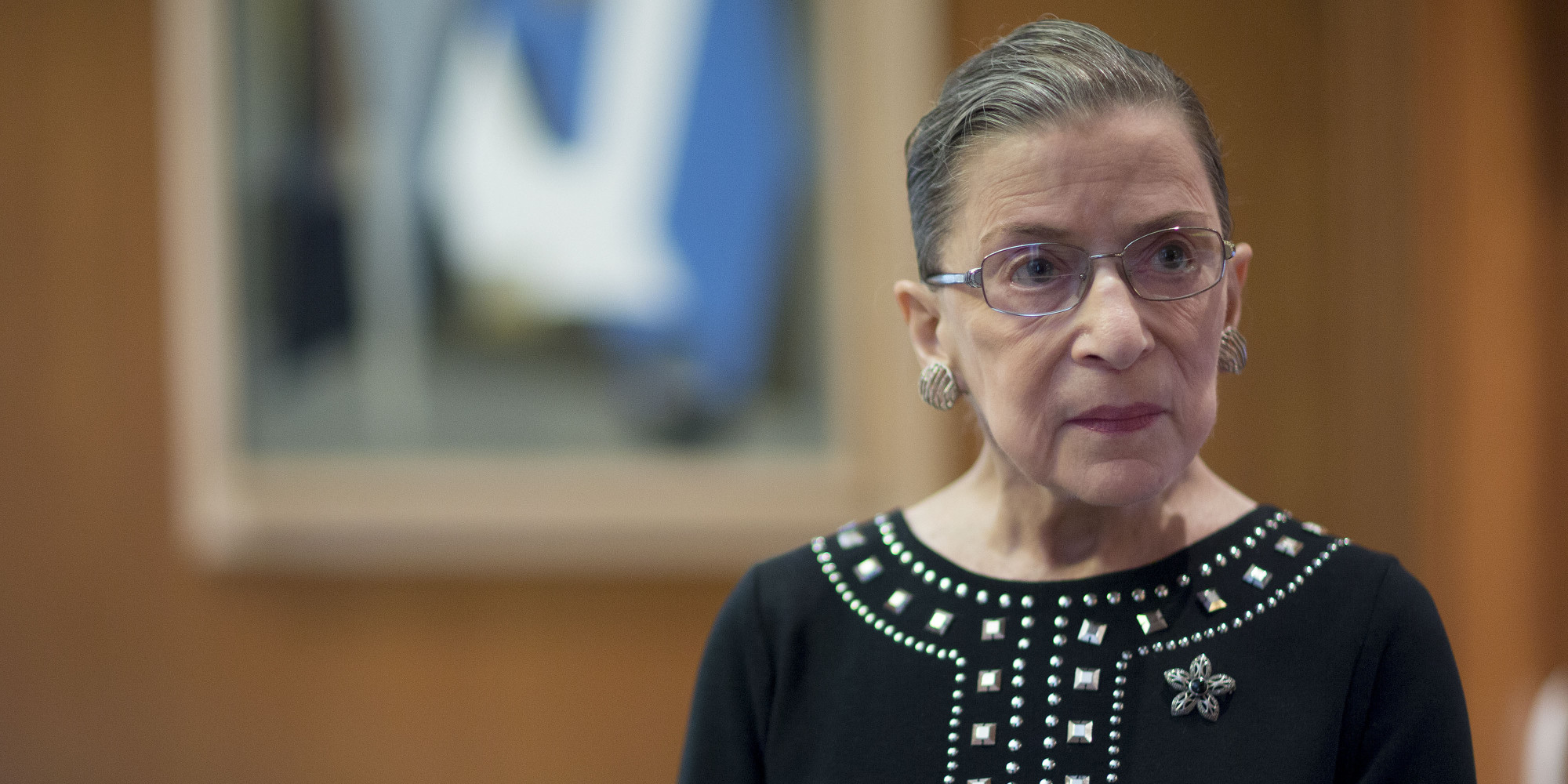 Ruth Bader Ginsburg, associate justice of the U.S. Supreme Court, stands in her chambers following an interview in Washington, D.C., U.S., on Friday, Aug. 23, 2013. Ginsburg, 80, the oldest member of the Supreme Court and appointed to the court in 1993 by Democratic President Bill Clinton, has said on several occasions that she wants to match the longevity of Justice Louis Brandeis, who was 82 when he stepped down in 1939. Photographer: Andrew Harrer/Bloomberg via Getty Images