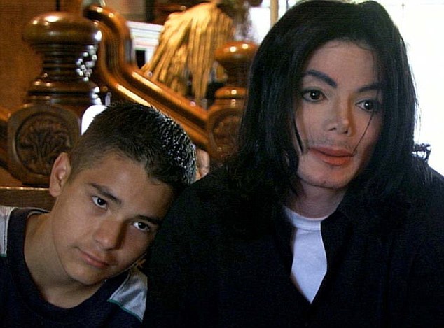 A Tonight Special
Living With Michael Jackson

Michael Jackson with 12 year-old Gavin in Neverland, California.  We don't know his surname.

These pictures are strictly embargoed until 10.50pm, Monday, February 3, 2003.  They are for UK national newspaper use only and must NOT be used on websites.  They cannot be syndicated.

You must credit Living with Michael Jackson - A Tonight Special, Granada Television if used.