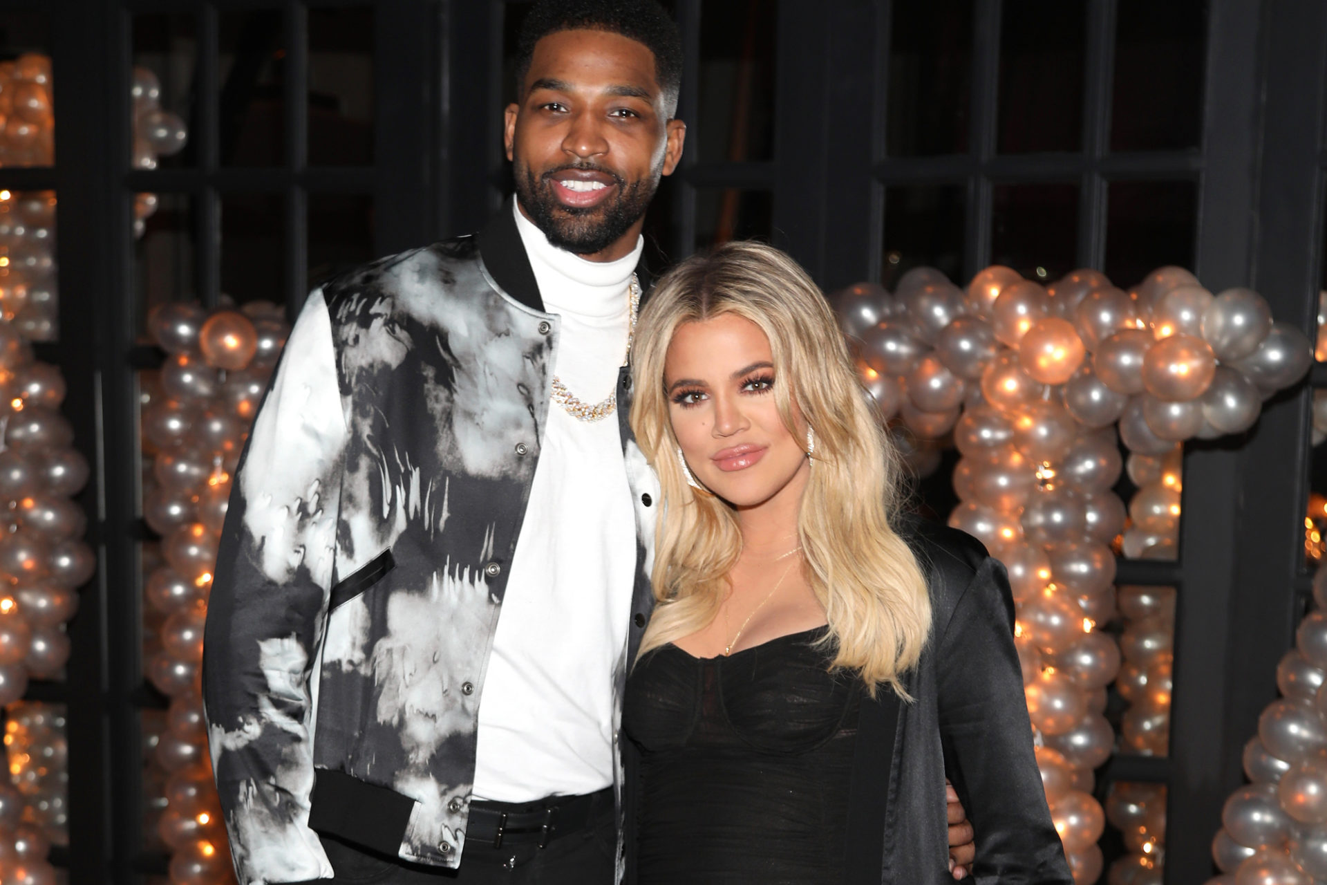 LOS ANGELES, CA - MARCH 10:  Tristan Thompson and Khloe Kardashian pose for a photo as Remy Martin celebrates Tristan Thompson's Birthday at Beauty