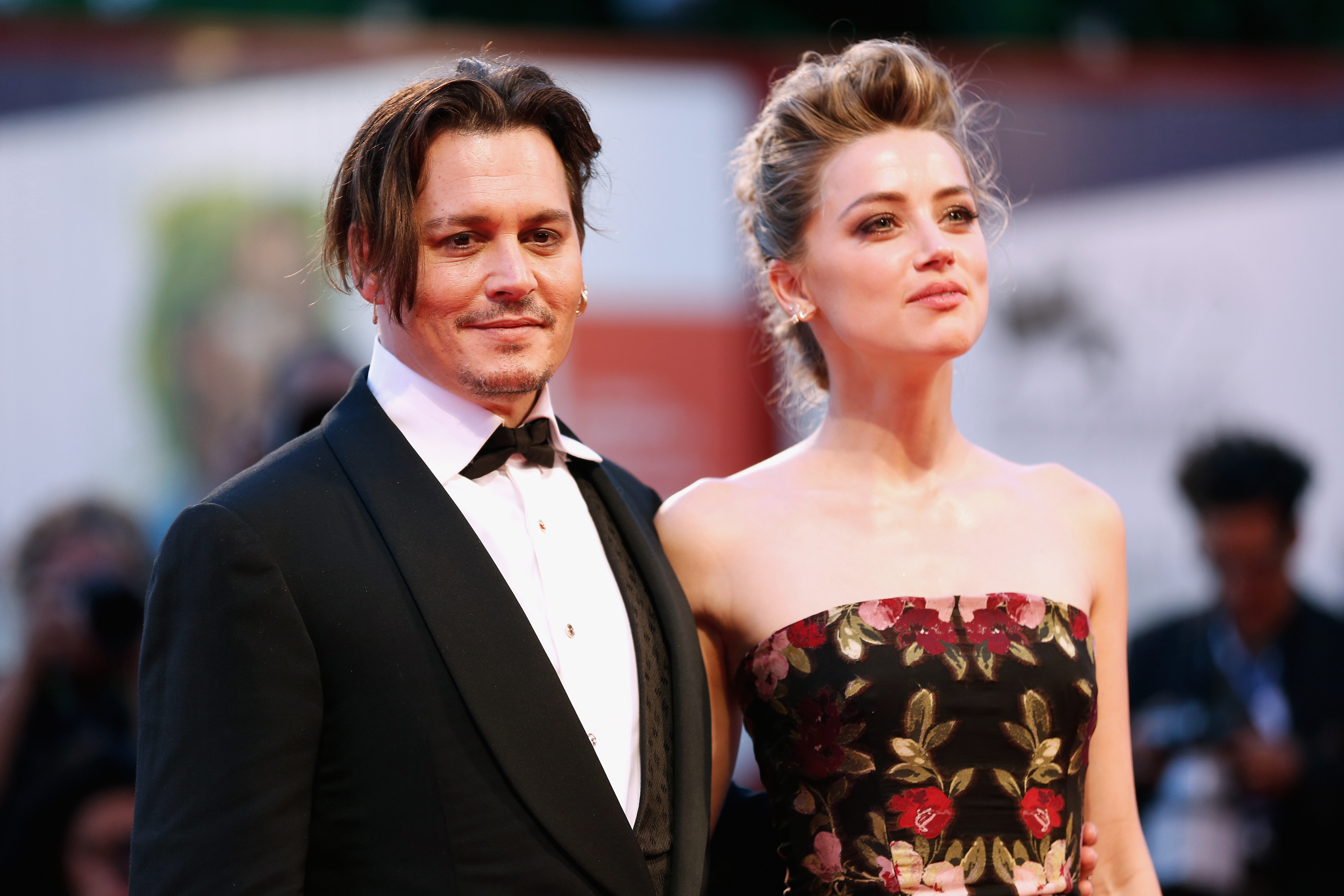 VENICE, ITALY - SEPTEMBER 05:  Johnny Depp and actress Amber Heard attend a premiere for 'The Danish Girl' during the 72nd Venice Film Festival at  on September 5, 2015 in Venice, Italy.  (Photo by Tristan Fewings/Getty Images)