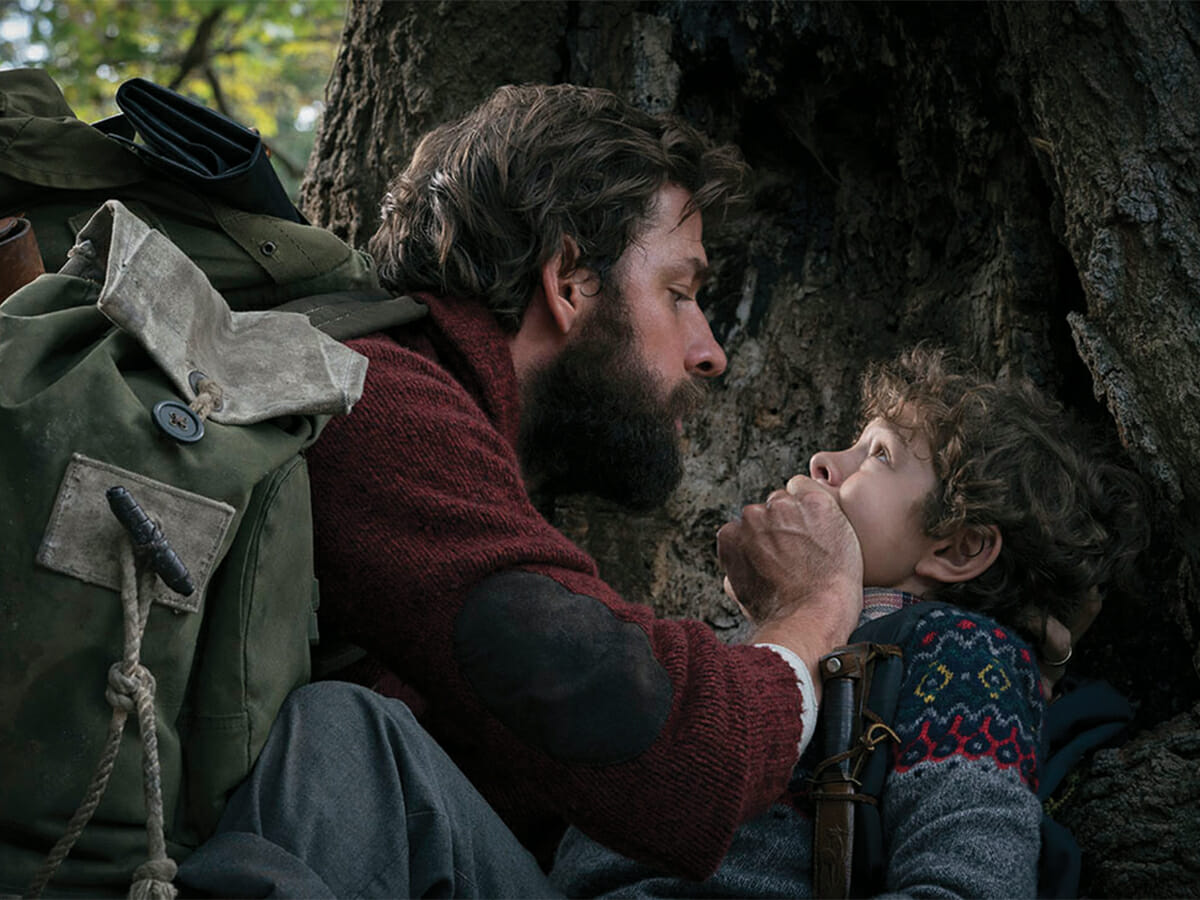 Left to right: John Krasinski plays Lee Abbott and Noah Jupe plays Marcus Abbott in A QUIET PLACE, from Paramount Pictures.